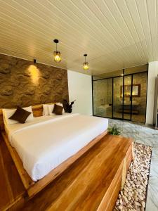 Ένα ή περισσότερα κρεβάτια σε δωμάτιο στο The Bliss Ella