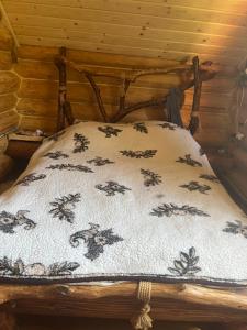 Ένα ή περισσότερα κρεβάτια σε δωμάτιο στο Думанія +12 φωτογραφίες