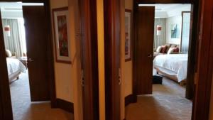 Postel nebo postele na pokoji v ubytování 3roos almandarah