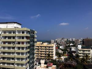 a view of a city with tall buildings at Scenic Lanka Luxury Rooms in Dehiwala