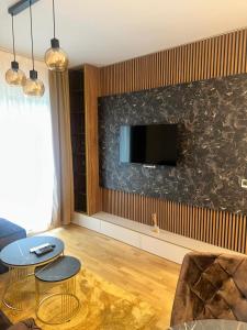 Μια τηλεόραση ή/και κέντρο ψυχαγωγίας στο JiV luxury apartment i spa