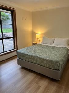 Postel nebo postele na pokoji v ubytování Brighton Home + 2 fotografie