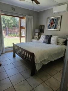 Postel nebo postele na pokoji v ubytování Stonehenge Cottage + 7 fotografií