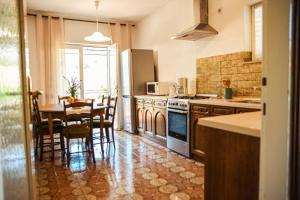 Η κουζίνα ή μικρή κουζίνα στο Sablic Apartmani