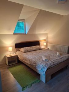 Postel nebo postele na pokoji v ubytování Apartman Petar + 39 fotografií
