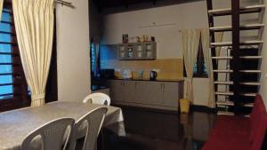 Kuchyň nebo kuchyňský kout v ubytování Moonlight Meadows + 4 fotografie