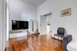 TV a/nebo společenská místnost v ubytování StarHome Colosseo