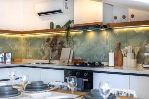 a kitchen with a sink and a stove at Vera home in Marmaris