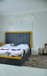 Postel nebo postele na pokoji v ubytování Zairesidences