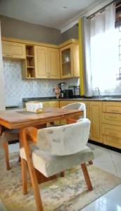 Kuchyň nebo kuchyňský kout v ubytování Zairesidences