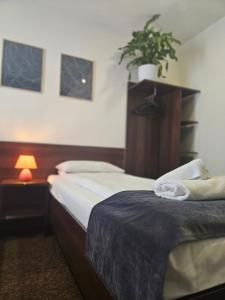 Katil atau katil-katil dalam bilik di Hotelik SJ