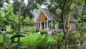 TengeruにあるNaishika Home Stayの庭のある家