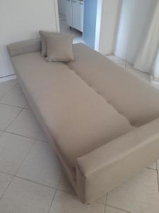 a large bed sitting on the floor in a room at Casa em Petrópolis in Petrópolis +10 photos