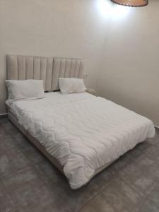 Voodi või voodid majutusasutuse Appartement de luxe toas