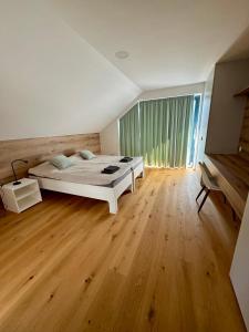 Postel nebo postele na pokoji v ubytování Elements Chopok + 29 fotografií