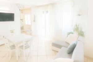 TV a/nebo společenská místnost v ubytování Affittacamere Athos