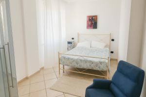 Postel nebo postele na pokoji v ubytování Affittacamere Athos