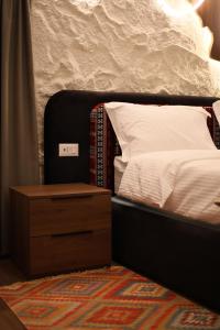 Ένα ή περισσότερα κρεβάτια σε δωμάτιο στο Muraga Villas