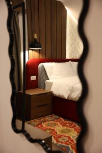 Ένα ή περισσότερα κρεβάτια σε δωμάτιο στο Muraga Villas +15 φωτογραφίες