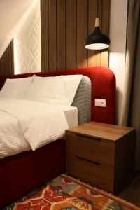 Ένα ή περισσότερα κρεβάτια σε δωμάτιο στο Muraga Villas