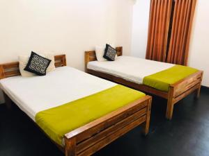 Postel nebo postele na pokoji v ubytování Mahayaya Village