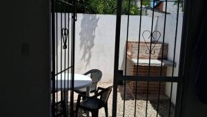 Un balcón o terraza de Departamentos El Silvio