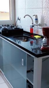 Køkken eller tekøkken på Residência Lima 1