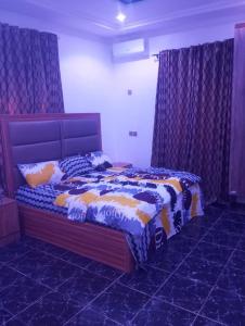 Кровать или кровати в номере Chizyntonapartment