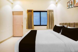 Fotografie z fotogalerie ubytování Hotel O Sai Palace v destinaci Karmād + 22 fotografií