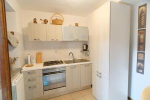 Η κουζίνα ή μικρή κουζίνα στο Casa di Sofia Montefiascone Apartment