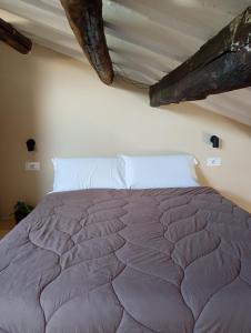 Una cama o camas en una habitación de Deco's Place Olivia