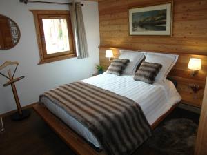 Postel nebo postele na pokoji v ubytování Chalet Pepette, Logement Calme et Élégant