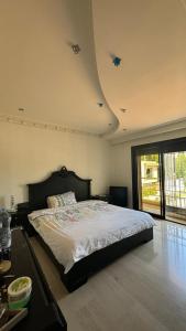 Ένα ή περισσότερα κρεβάτια σε δωμάτιο στο Beautiful villa for rent in Tangier