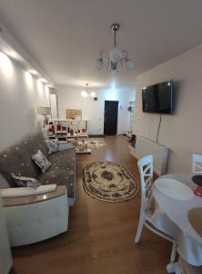 TV a/nebo společenská místnost v ubytování Lumar Residence Sibiu