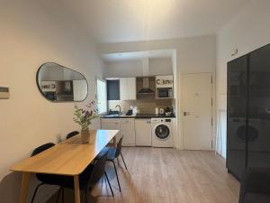 Η κουζίνα ή μικρή κουζίνα στο Retiro Residence Zafiro +20 φωτογραφίες