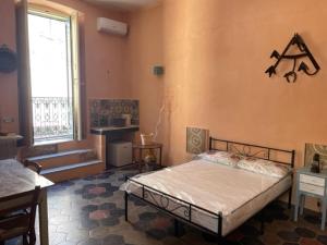 Postel nebo postele na pokoji v ubytování Casa Mari