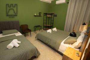 Ένα ή περισσότερα κρεβάτια σε δωμάτιο στο Pietra del Castello