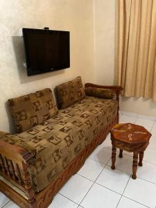 Μια τηλεόραση ή/και κέντρο ψυχαγωγίας στο Premium Stay Apartment, Rabat