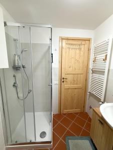 a bathroom with a shower and a sink at La Villetta Trepidò in Casa Pasquale +26 photos