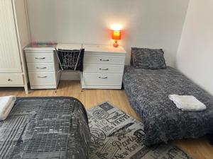 Postel nebo postele na pokoji v ubytování Shared homestay near Stratford