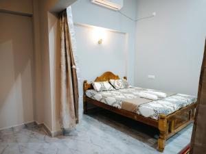 Ένα ή περισσότερα κρεβάτια σε δωμάτιο στο Aao Sai Retreats