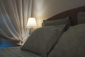 Katil atau katil-katil dalam bilik di Orma cozy haven
