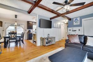 a living room with a couch and a table at Pocono - Home away from home in Tobyhanna