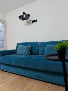 Posezení v ubytování Cinema Loft апартаменты с проектором в центре города + 2 fotografie