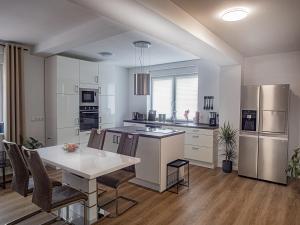 Kuchyň nebo kuchyňský kout v ubytování Ferienwohnungen Take off