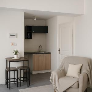 Nhà bếp/bếp nhỏ tại Cocon Naturel en Sologne!