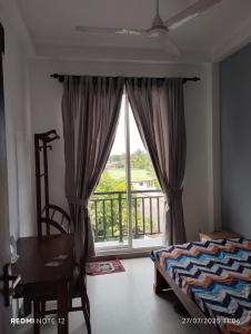 Ένα ή περισσότερα κρεβάτια σε δωμάτιο στο City View Homestay