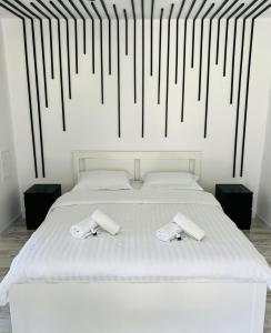 Ένα ή περισσότερα κρεβάτια σε δωμάτιο στο The W Villa