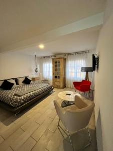 Postel nebo postele na pokoji v ubytování NIDO Hotel