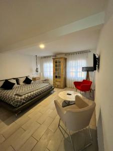 Postel nebo postele na pokoji v ubytování NIDO Hotel